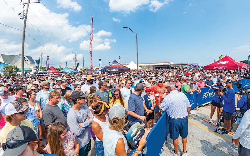 Crowd gathers near the official Big Rock scales in downtown Morehead City during tournament week
