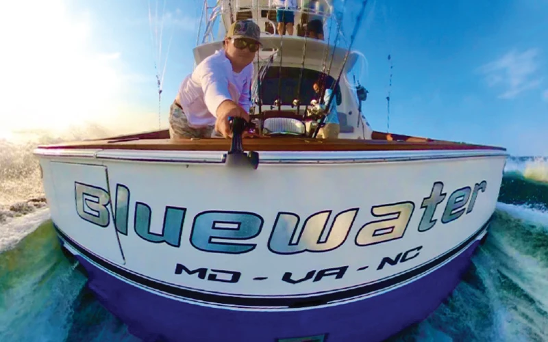 GoPro selfie of the Bluewater Viking 64 running offshore, highlighting the transom branding
