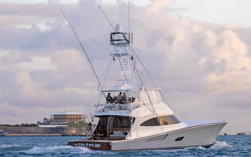 Viking 82 returns to port after a successful tournament day, framed by pastel evening skies