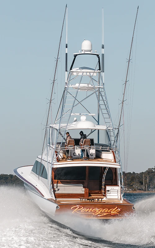 Jarrett Bay 68 sportfish named 'Renegade' running offshore, showcasing Palm Beach Tower and custom transom design