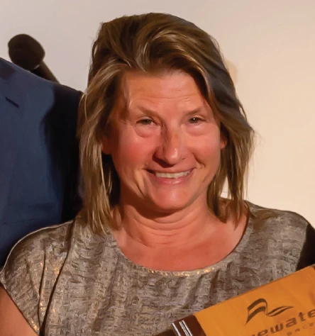 Maureen O Sullivan receiving the Excellence and Dedication Award