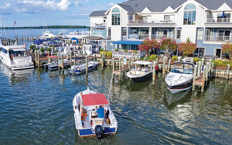 Water taxi arriving at the dock near Harrison’s Harbor Lights restaurant in downtown St. Michaels, Maryland