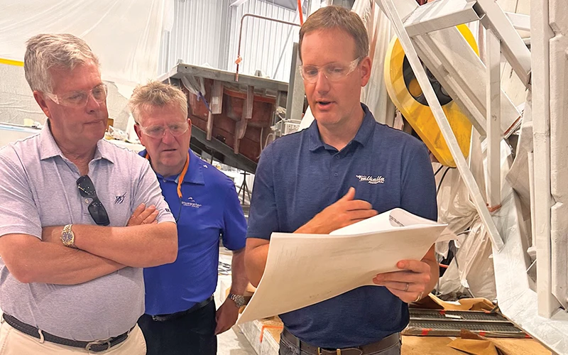 John Donoghue reviewing build plans with John Leek IV and the Valhalla team at the Mullica, NJ factory