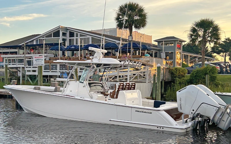 Valhalla V-33 docked at Sharky’s Restaurant in Ocean Isle Beach, North Carolina at sunset