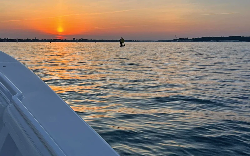 View of the Chesapeake Bay at sunset from the bow of the Belliveaus’ Regulator 34 center console