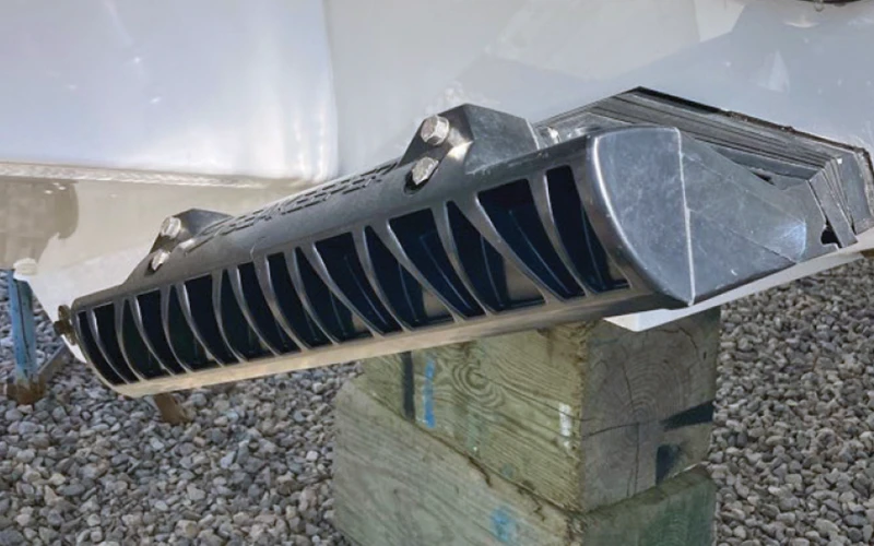 Mounted Seakeeper Ride rotary blade tab on boat transom with visible structural fins