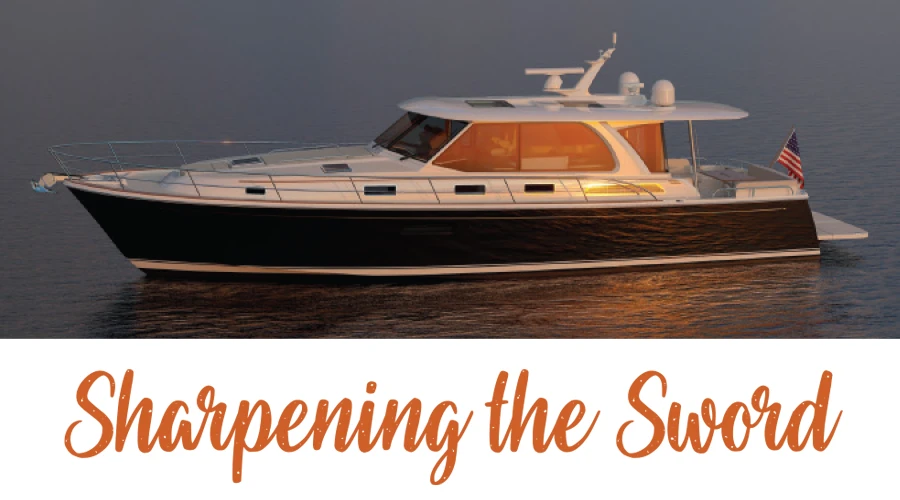 Profile view of the Sabre 51 Salon Express cruising at sunset, showcasing its Downeast styling and luxury profile