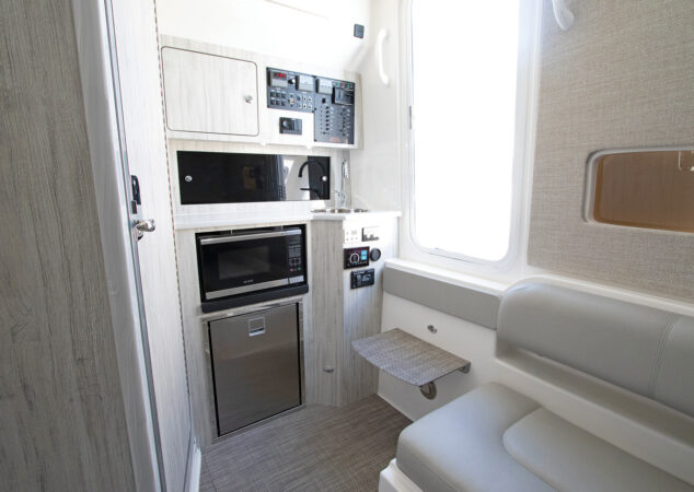 Galley with appliances inside a Regulator 37