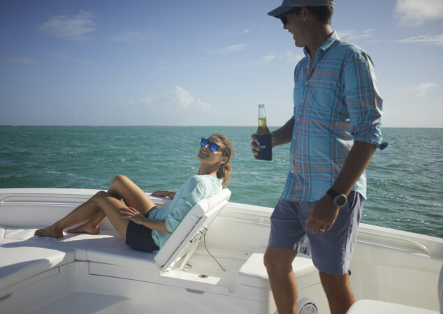 Guy brings girl a drink flip-up backrest on Regulator 26XO