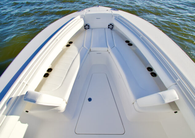 Forward bow seating with wraparound cushions and speakers on the Regulator 25