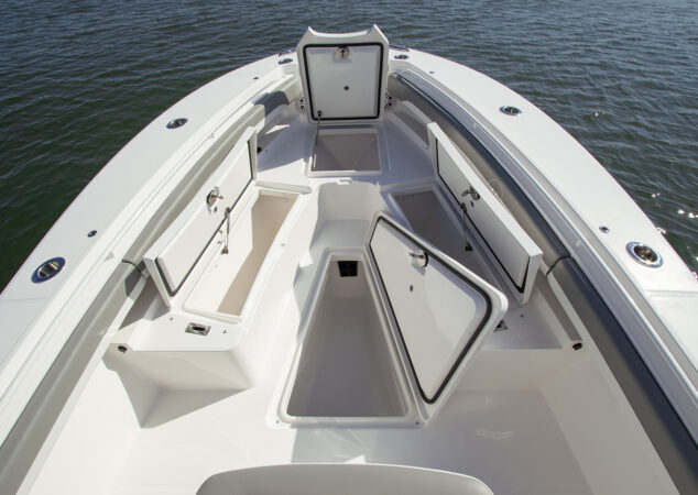 Multiple storage hatches open in the bow of the Regulator 25