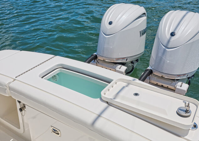 Transom layout featuring livewell, cutting board lid, and Yamaha outboards