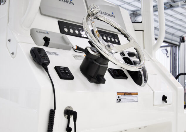 Angled shot of the steering wheel, Garmin electronics, and Yamaha controls