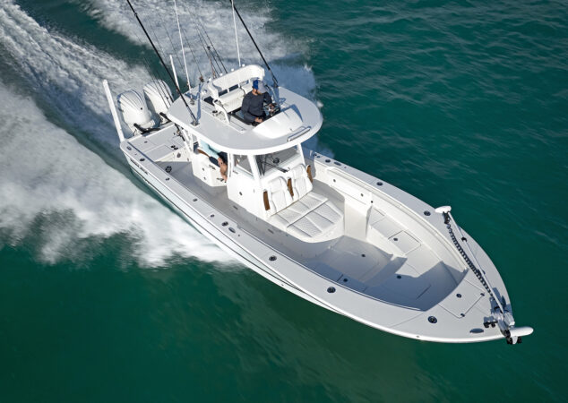 Close angled view highlighting forward lounge seating and upper helm on the Regulator 30XO