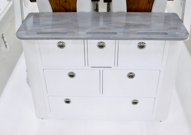 Cockpit tackle center featuring a Corian counter and multiple drawers for gear storage