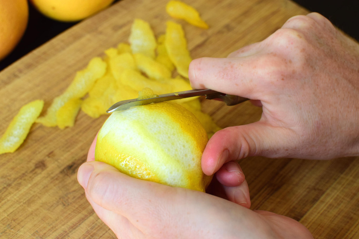 Peeling some lemons.