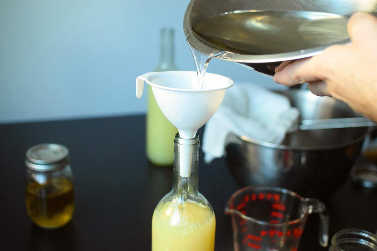 Adding simple syrup to dilute and sweeten.