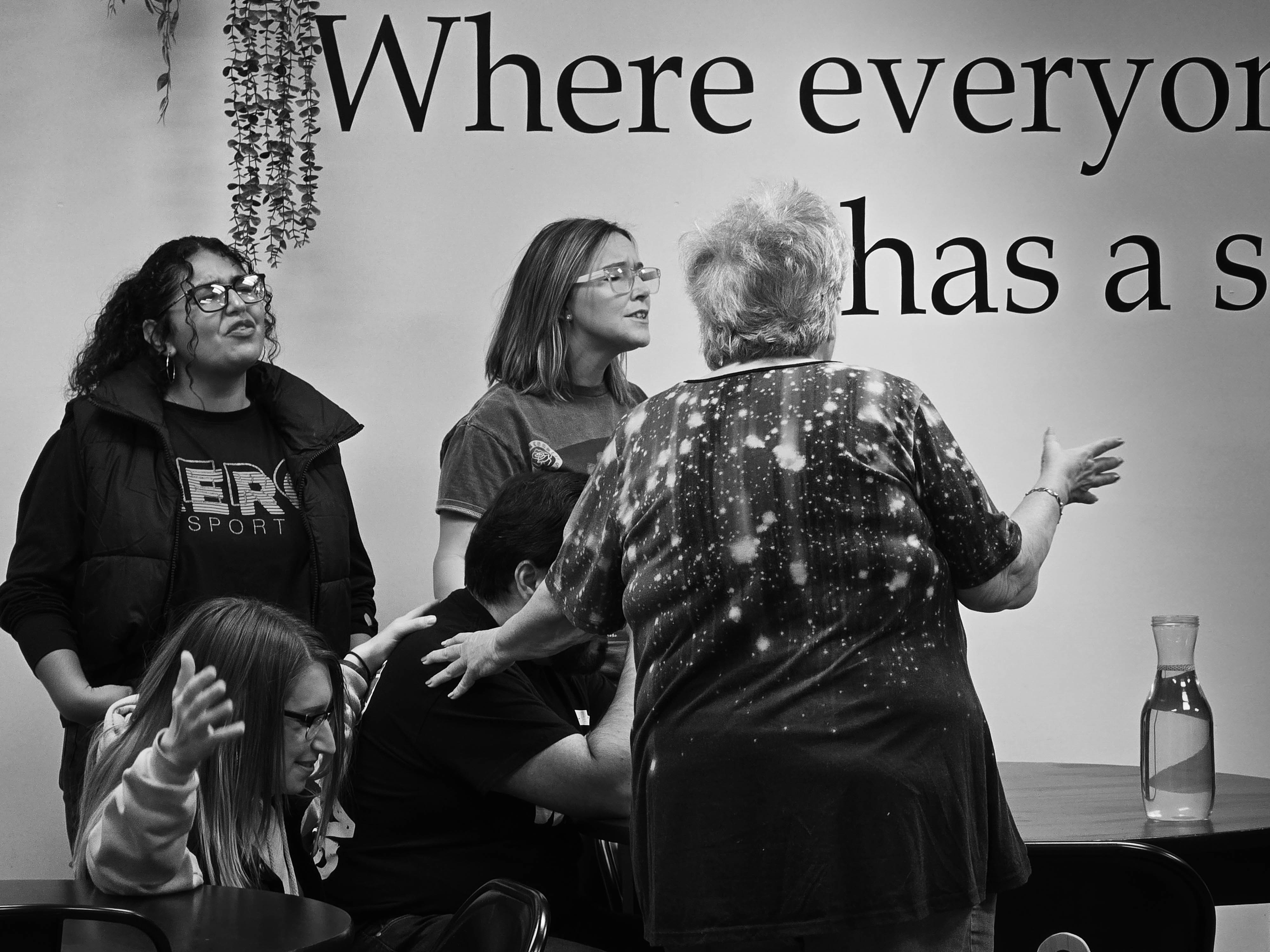 Women praying together through the MIRA Home