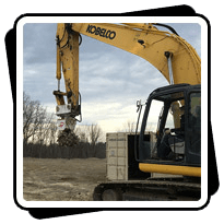 Antraquip AQ-3XL on Kobelco 260 cutting hard shale for Hotel site preparation in New York State