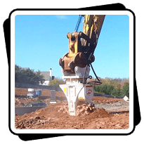 AQ5 on CAT349 rock removal for highway expansion