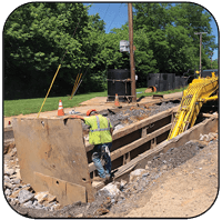 AQ-4XL Drum Cutter on PC490 Trenching Limestone in Pennsylvania