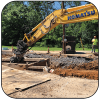 AQ-4XL Drum Cutter on PC490 Trenching Limestone in Pennsylvania