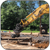 AQ-4XL Drum Cutter on PC490 Trenching Limestone in Pennsylvania