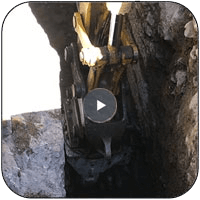 AQ-4XL Drum Cutter on PC490 Trenching Limestone in Pennsylvania