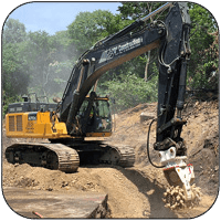 AQ-5 on JD470 Trenching Limestone for Pipeline Project