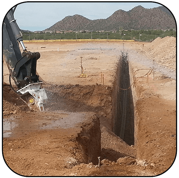 AQ-5 on JD470 Trenching Limestone for Pipeline Project