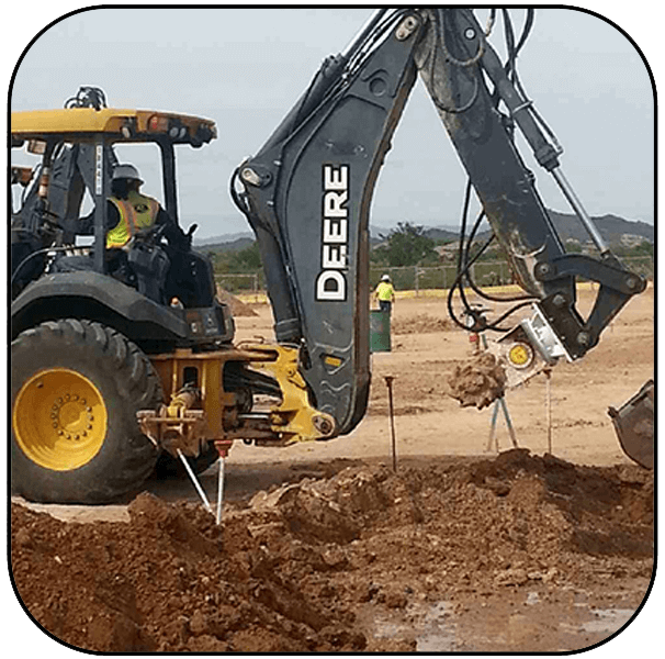 AQ-5 on JD470 Trenching Limestone for Pipeline Project