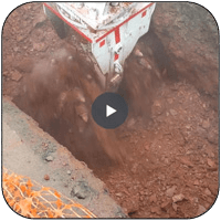 AQ4 on CAT336 Trenching in hard shale in outside of Washington DC.