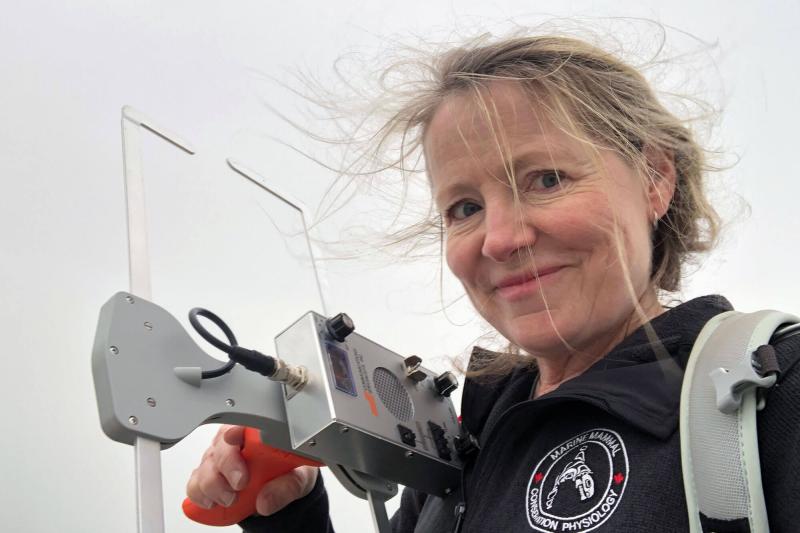 Sheila Thornton holding VHF receiver