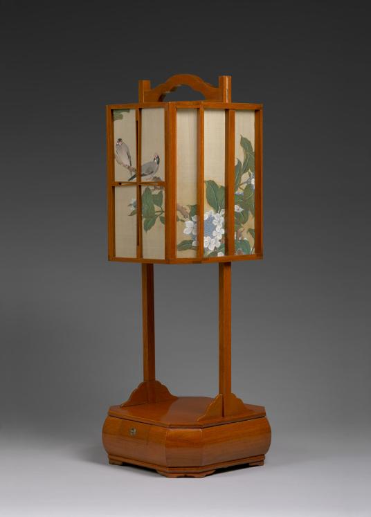 A wood-framed lantern with a square wood base and silk surface shows two small birds and blooming branches of a blue lace cap hydrangea.