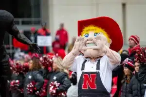 Nebraska Cornhusker mascot Herbie cheering Go Big Red while waitng for the Unity Walk before a college football game against the Purdue Boilermakers on Saturday, October 28, 2023, in Lincoln, Nebraska. Photo by John S. Peterson.