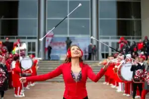 Nebraska Cornhusker baton twirler performing at the Unity Walk before the college football game aPurdue Boilermakers on Saturday, October 28, 2023, in Lincoln, Nebraska. Photo by John S. Peterson.