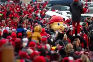 Nebraska Cornhusker mascot Lil' Red makes his way through the sea of red before a college football game against the Purdue Boilermakers on Saturday, October 28, 2023, in Lincoln, Nebraska. Photo by John S. Peterson.
