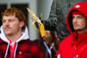 Bob Devaney stature holding an ear of corn before a college football game against the Purdue Boilermakers on Saturday, October 28, 2023, in Lincoln, Nebraska. Photo by John S. Peterson.