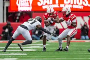 Nebraska Cornhuskers Emmett Johnson (21) runs with the ball against Purdue Boilermakers Sanoussi Kane (21) in the first quarter during a college football game on Saturday, October 28, 2023, in Lincoln, Nebraska. Photo by John S. Peterson.