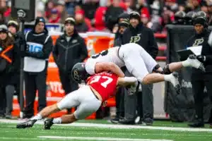 Nebraska Cornhuskers Phalen Sanford (37) tackles Purdue Boilermakers Garrett Miller (88) in the first quarter during a college football game on Saturday, October 28, 2023, in Lincoln, Nebraska. Photo by John S. Peterson.