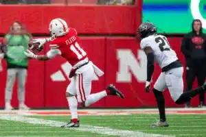 Nebraska Cornhuskers Joshua Fleeks (11) makes a catch against Purdue Boilermakers Sanoussi Kane (21) in the first quarter during a college football game on Saturday, October 28, 2023, in Lincoln, Nebraska. Photo by John S. Peterson.