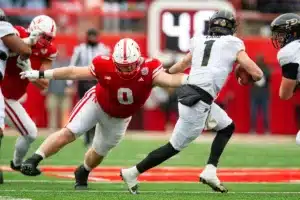 Nebraska Cornhuskers Nash Hutmacher (0) reaches for Purdue Boilermakers Hudson Card (1) in the first half during a college football game on Saturday, October 28, 2023, in Lincoln, Nebraska. Photo by John S. Peterson.