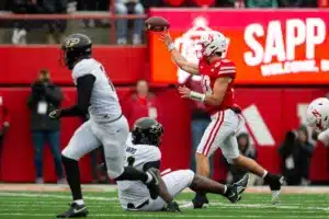 Nebraska Cornhuskers Heinrich Haarberg (10) makes a pass to Emmett Johnson (21) in the first quarter against the Purdue Boilermakers during a college football game on Saturday, October 28, 2023, in Lincoln, Nebraska. Photo by John S. Peterson.