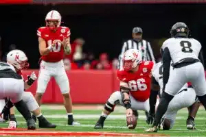 Nebraska Cornhuskers Ben Scott (66) gets ready to snap the ball to Heinrich Haarberg (10) in the first quarter against the Purdue Boilermakers during a college football game on Saturday, October 28, 2023, in Lincoln, Nebraska. Photo by John S. Peterson.