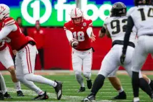 Nebraska Cornhuskers Brian Buschini (18) punts the ball away in the first quarter against the Purdue Boilermakers during a college football game on Saturday, October 28, 2023, in Lincoln, Nebraska. Photo by John S. Peterson.