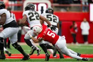 Nebraska Cornhuskers John Bullock (5) tackles Purdue Boilermakers Dylan Downing (22) in the first quarter during a college football game on Saturday, October 28, 2023, in Lincoln, Nebraska. Photo by John S. Peterson.