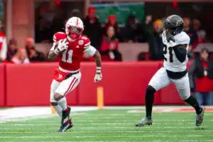 Nebraska Cornhuskers Joshua Fleeks (11) runs with the ball against Purdue Boilermakers Sanoussi Kane (21) in the first quarter during a college football game on Saturday, October 28, 2023, in Lincoln, Nebraska. Photo by John S. Peterson.