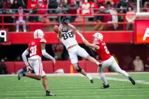 Nebraska Cornhuskers Isaac Gifford (2) breaks a pass o Purdue Boilermakers Garrett Miller (88) in the first half during a college football game on Saturday, October 28, 2023, in Lincoln, Nebraska. Photo by John S. Peterson.