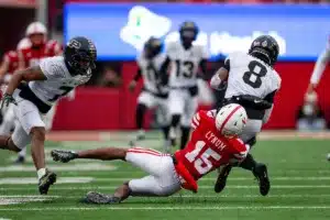 Nebraska Cornhuskers Tamon Lynum (15) tackles Purdue Boilermakers TJ Sheffield (8) on a punt in the third quarter during a college football game on Saturday, October 28, 2023, in Lincoln, Nebraska. Photo by John S. Peterson.
