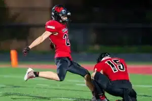 Westside High School Brody Goc (23) kicks an extra point during a game between Lincoln North East and Westside in Omaha, NE on Thursday October 19tth, 2023. Photo by Eric Francis